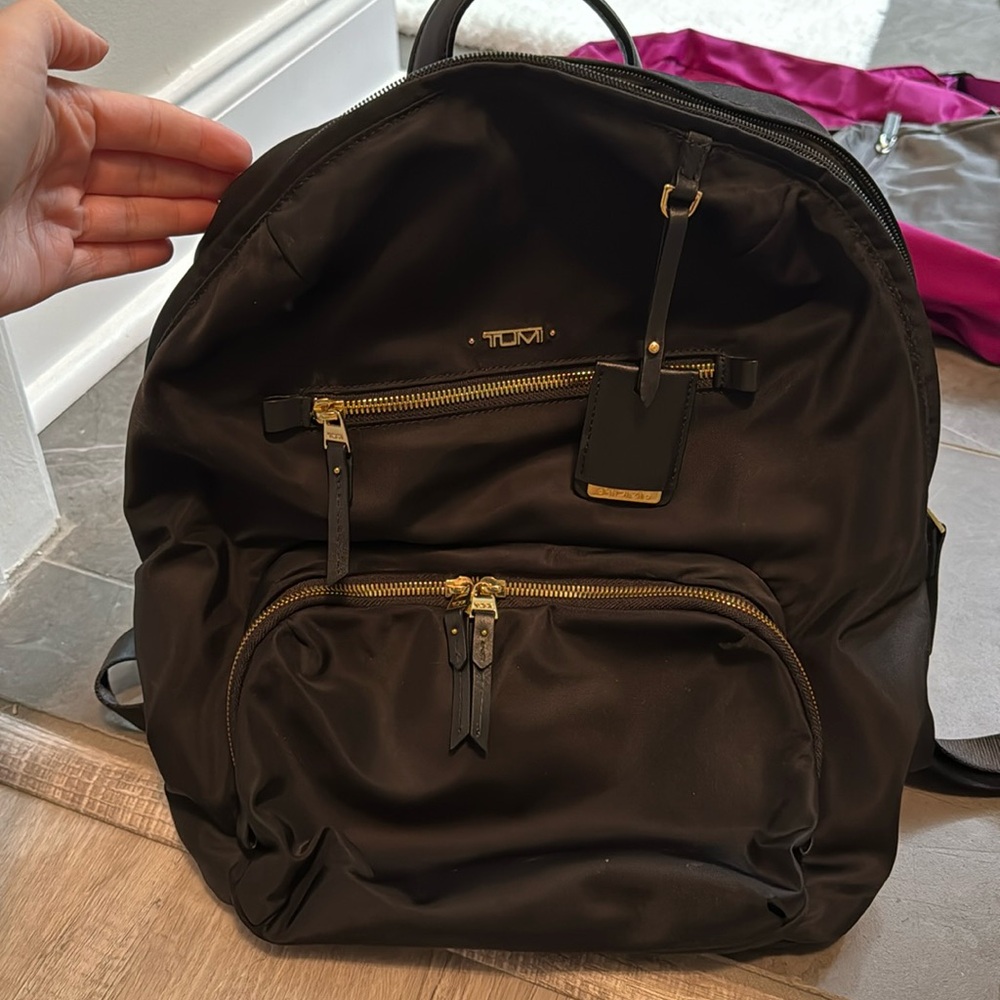 Tumi black backpack